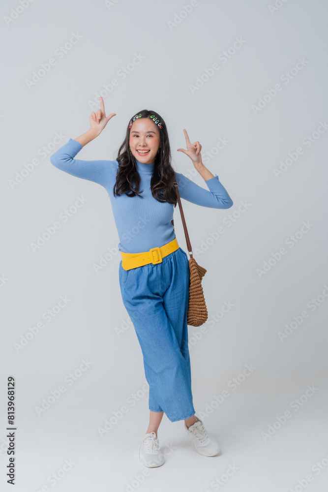 stylish asian woman fungy hipster blue cloth fashionista freshness dreass and makeup happiness confident playful asia woman charecter travel casual relax leisure lifestyle studio shot portriat smile stylish asian woman fungy hipster blue cloth fashionista freshness dreass and makeup happiness confident playful asia woman charecter travel casual relax leisure lifestyle studio shot portriat smile