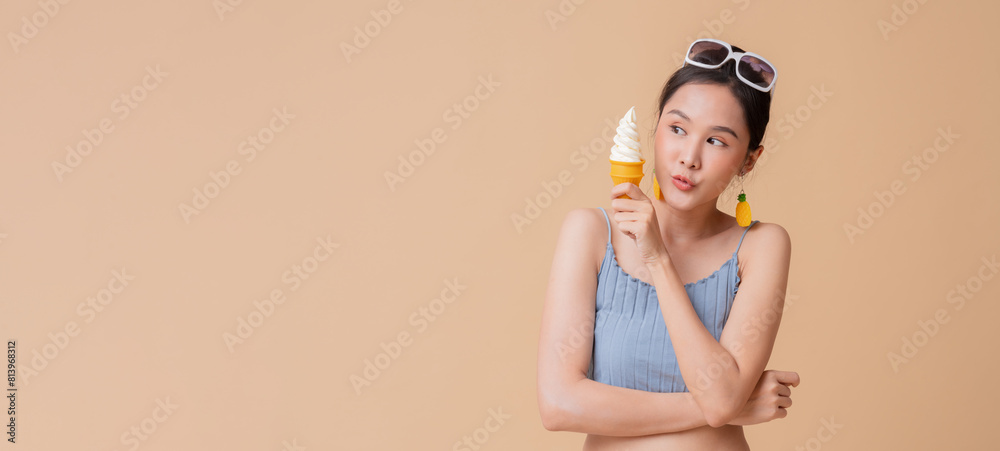summer freshness asian cheerful swimwear woman wear sun glasses hand hold ice cream sweet dessert smiling happiness summertime advertisment studio photoshoot cute and curious friendly on color screen summer freshness asian cheerful swimwear woman wear sun glasses hand hold ice cream sweet dessert smiling happiness summertime advertisment studio photoshoot cute and curious friendly on color screen