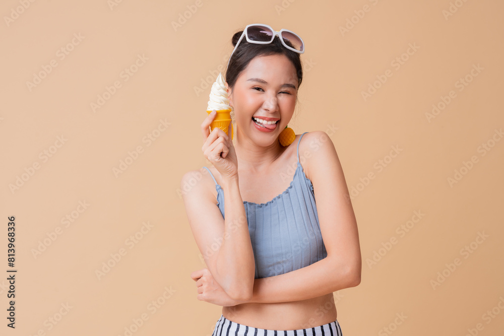 summer freshness asian cheerful swimwear woman wear sun glasses hand hold ice cream sweet dessert smiling happiness summertime advertisment studio photoshoot cute and curious friendly on color screen summer freshness asian cheerful swimwear woman wear sun glasses hand hold ice cream sweet dessert smiling happiness summertime advertisment studio photoshoot cute and curious friendly on color screen
