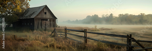 A tranquil morning scene with a rustic farm enveloped in mist, capturing the serene start of a countryside day Photo realistic concept of Misty Morning on the Farm