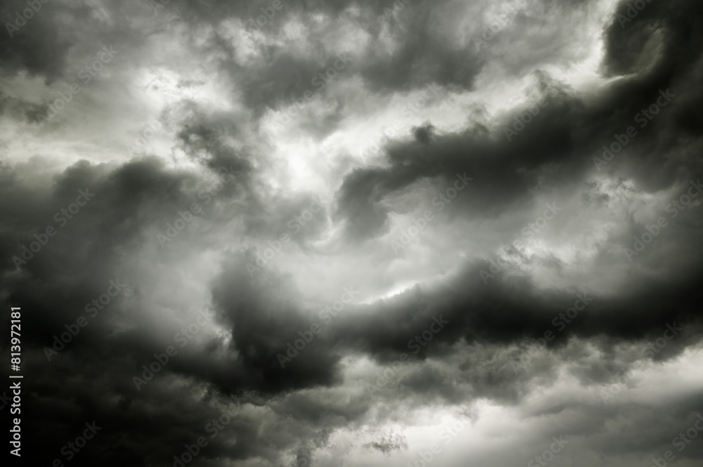 A large storm cloud looms over the landscape. A large storm cloud looms over the landscape.