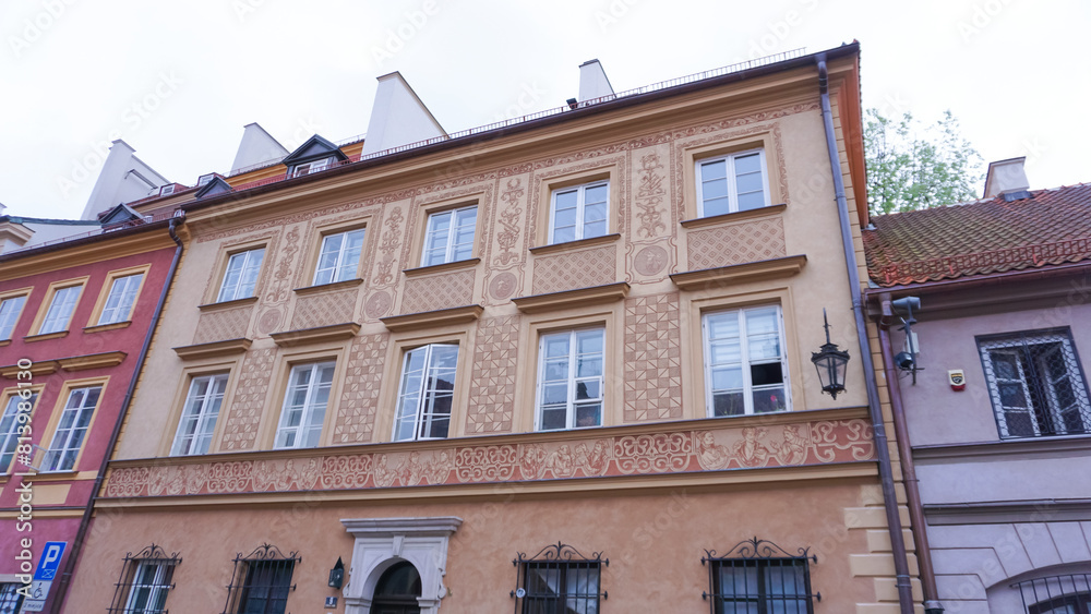 Naklejka premium Rows of old colorful historic houses at old town market square, warsaw, poland
