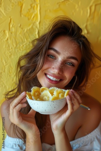 A woman holding a bowl of food, perfect for food-related designs