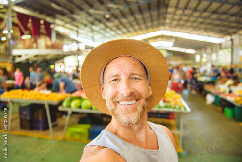 Photography young man taking selfie at grocery shop
