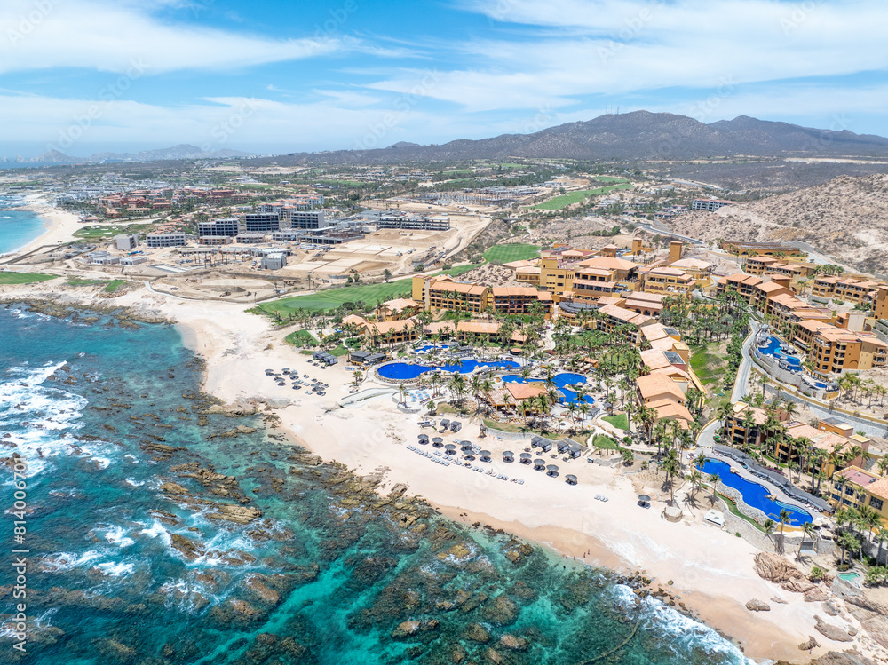 Fototapeta premium Aerial view of tropical beach with resorts in Cabo San Jose, Baja California Sur, Mexico