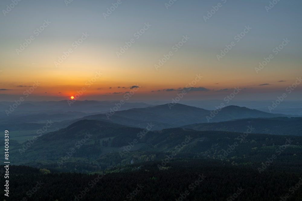 View from Jested hill on spring fresh landscape with color sunset