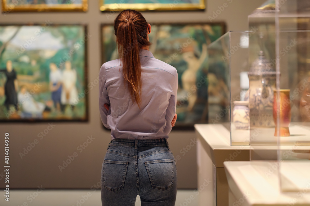 Woman Visiting Art Gallery Lifestyle Concept. Woman Visiting Art Gallery Lifestyle Concept.