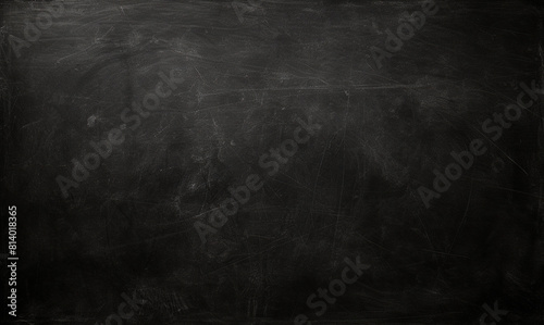 Textured blackboard surface with scratch marks  ideal for educational backgrounds  school-related designs. Realistic  black school board texture.