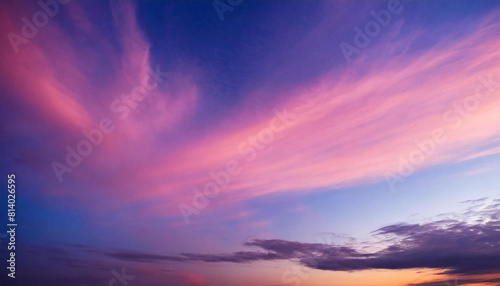 Beautiful sunset sky background. Colorful twilight sky with cloud.