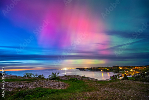 Northern light dancing over the Baltic sea at island of Gotland.