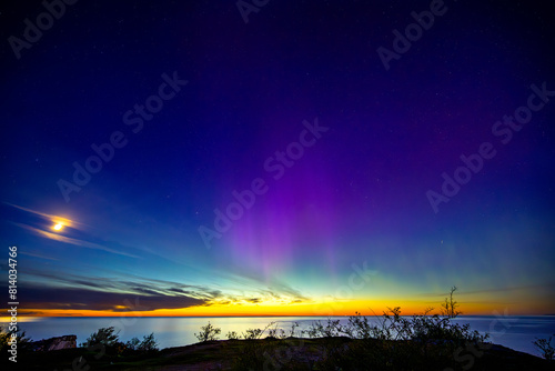 Northern light dancing over the Baltic sea at island of Gotland.