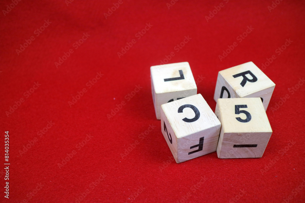 Educational stacking cube toy made of wood with numbers and letters Educational stacking cube toy made of wood with numbers and letters