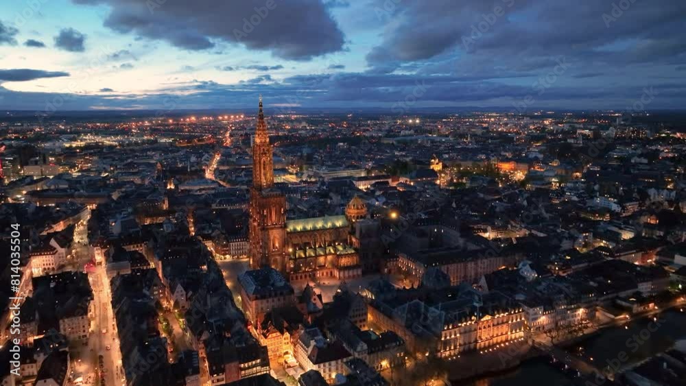 4K Aerial view of a Cathedral of Notre Dame, buildings architecture with night sky view. Strasbourg France