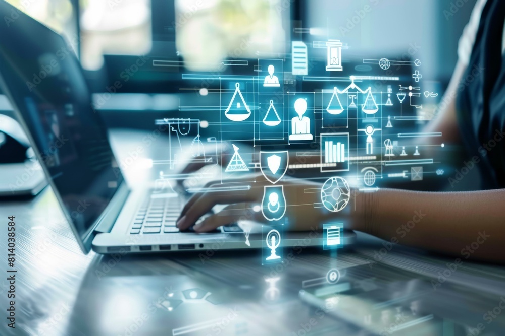  Person using a laptop with futuristic digital icons for legal, technology, and security concepts.
