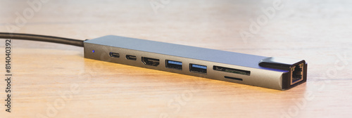 Laptop USB Type-C adapter with different connectors for connecting devices.