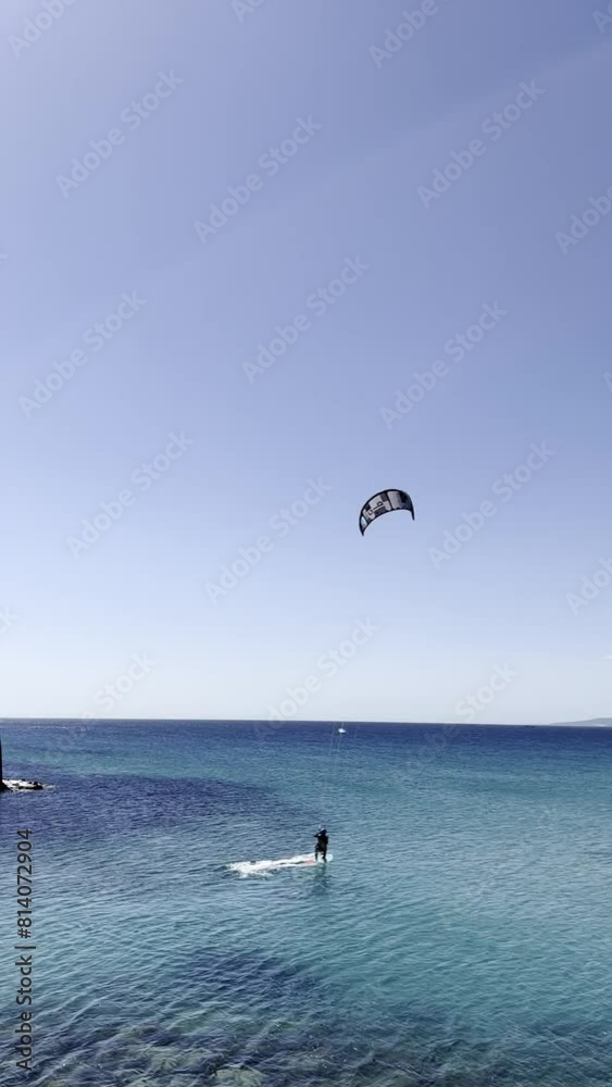 A group of kitesurfers surfing in the Gibraltar area A group of kitesurfers surfing in the Gibraltar area