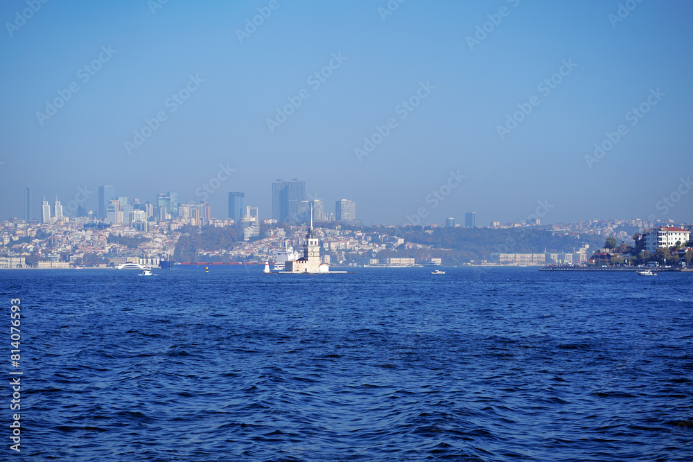 Istanbul, Turkey. Bosphorus with a famous Maiden's Tower (Kiz Kulesi). Scenic Turkish travel background. Istanbul, Turkey. Bosphorus with a famous Maiden's Tower (Kiz Kulesi). Scenic Turkish travel background.
