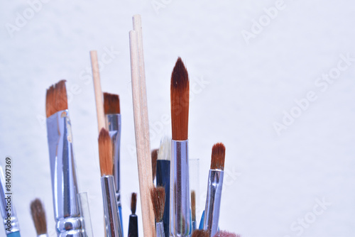 a set of dirty brushes and paintbrushes from having painted too much