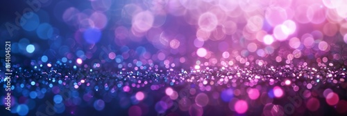 Abstract background with shimmering pink, purple, and blue bokeh lights, creating a dreamy and vibrant atmosphere