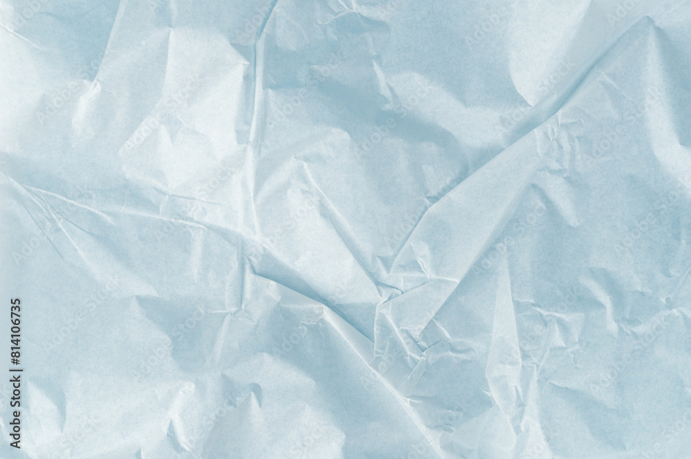 Obraz premium Creased blue paper background