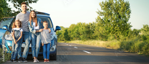 Happy family near car outdoors
