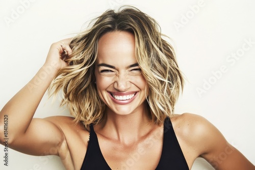 A Smiling Young Woman with Healthy Blonde Hair, Exuding Confidence and Joy in a Close-Up Portrait Against a White Background, Celebrating Natural Beauty and Elegance, Generative AI
