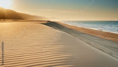 A pristine sandy beach stretching as far as the eye can see, kissed by the gentle rays of the morning sun. AI generated