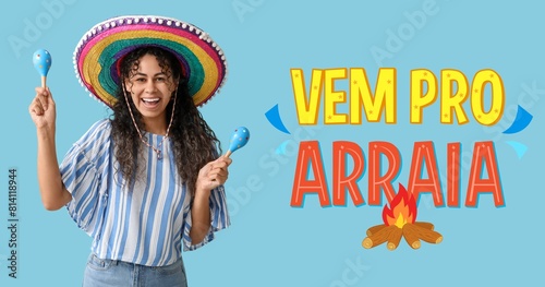 Happy young woman in sombrero hat and text VEM PRO ARRAIA (let's go to arraia tent) on light blue background. Banner for Festa Junina (June Festival) photo