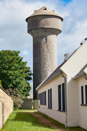 Water tower converted into a climbing wall in Pleyber-Christ