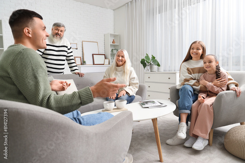 Big family chatting at home