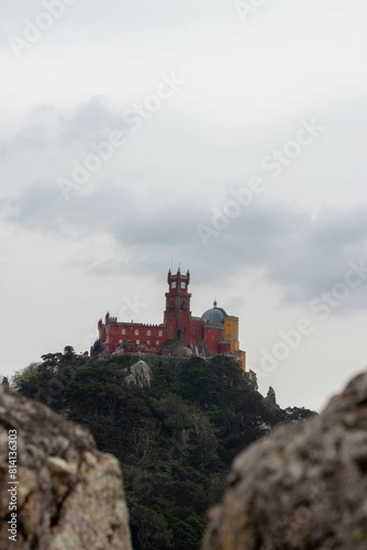 View of the Colorful Sintra Castle from the Moorish Castle in Sintra Portugal