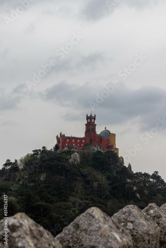 View of the Colorful Sintra Castle from the Moorish Castle in Sintra Portugal