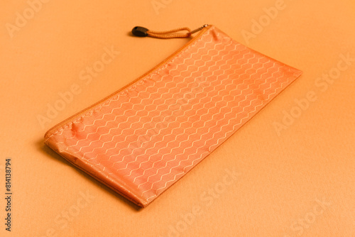 Orange pencil case with zip...