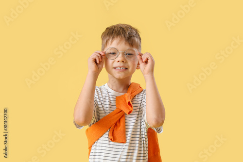 Cute little boy in eyeglass...