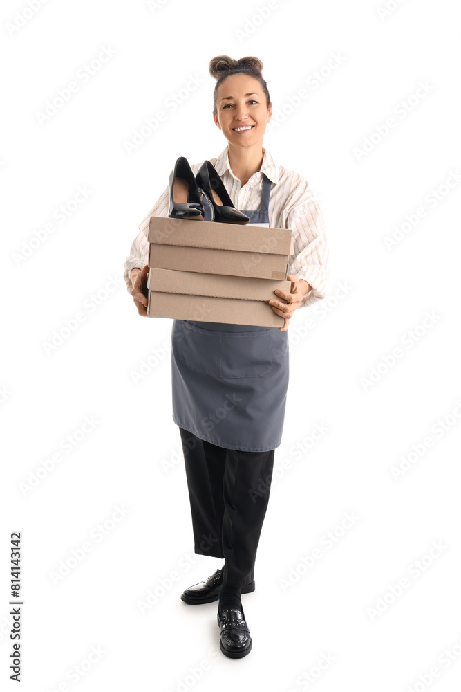 Happy female shoemaker with boxes and shoes on white background Happy female shoemaker with boxes and shoes on white background