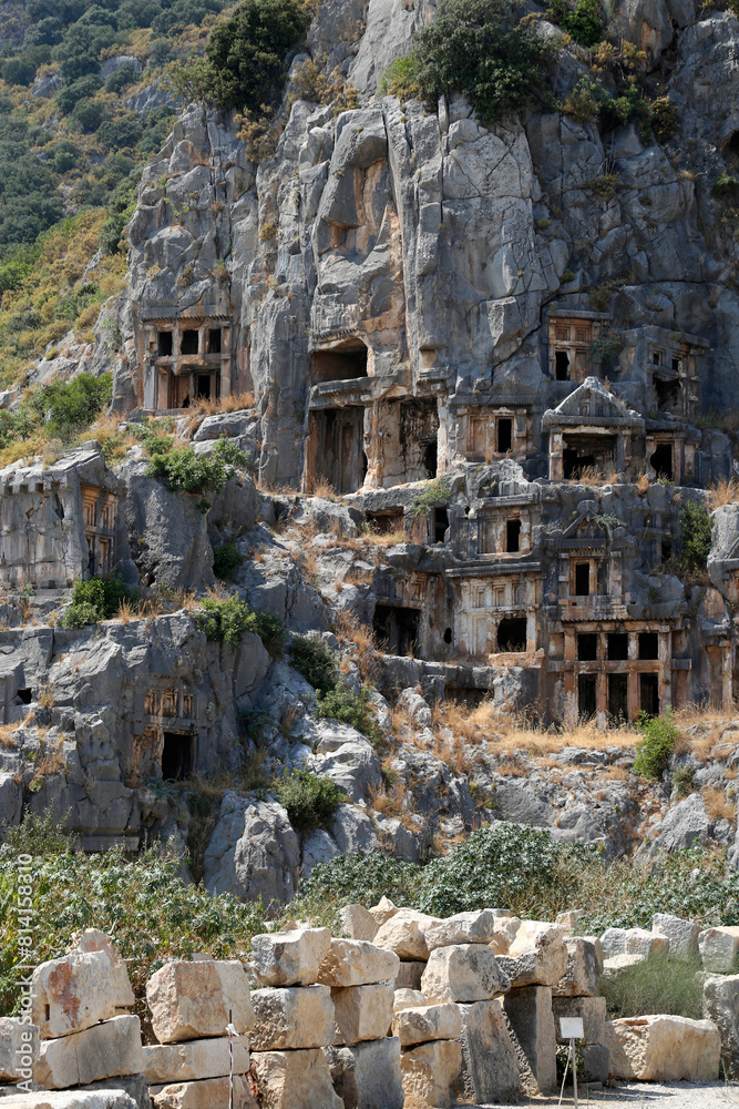 Rocks with caves for the burial of people. Ancient city Myra. Lycia region, Antalya, Turkey.