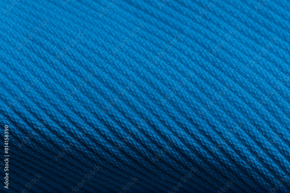 Closeup of blue corduroy cloth as patterned textured background