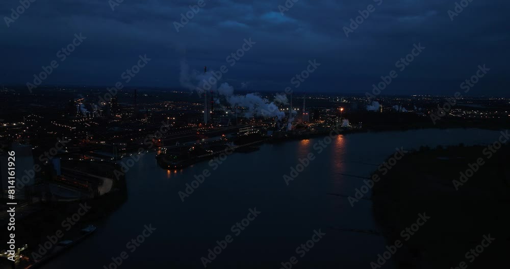 Aerial view of a cokes factory in Duisburg, Germany at night. Aerial view of a cokes factory in Duisburg, Germany at night.