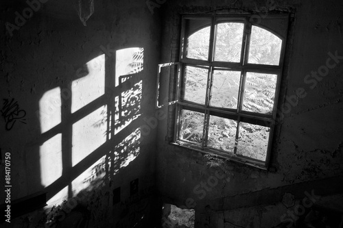 Broken windows in the old abandoned building.
