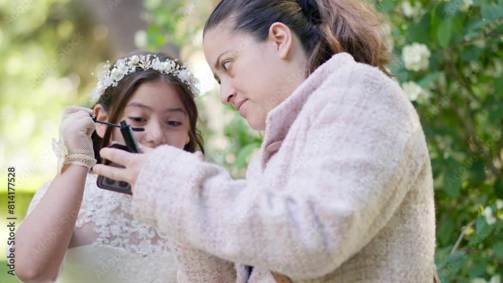 First Communion girl in white dress doing makeup and her mom looking proud.MOV First Communion girl in white dress doing makeup and her mom looking proud.MOV