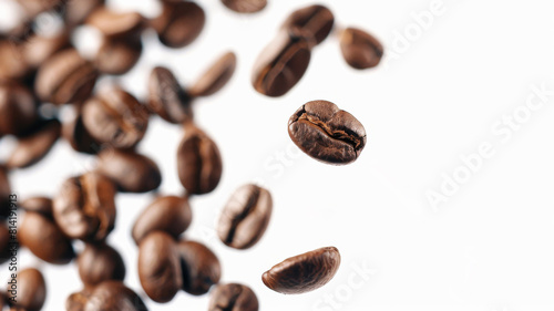coffee beans floating Isolated on white background.