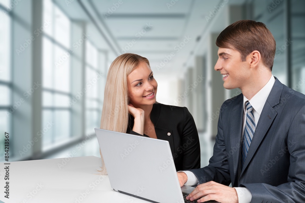Professional business managers team working sitting at table. Professional business managers team working sitting at table.
