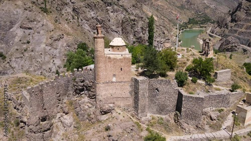 Historical castle ruins from the Middle Ages. Historical stone ruins in Ispir district, located by the coruh river. photo