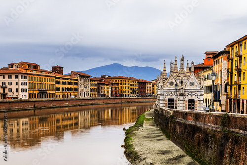 Ancient cathedral Santa Maria della Spina along the Arno River in scenic  Pisa Italy