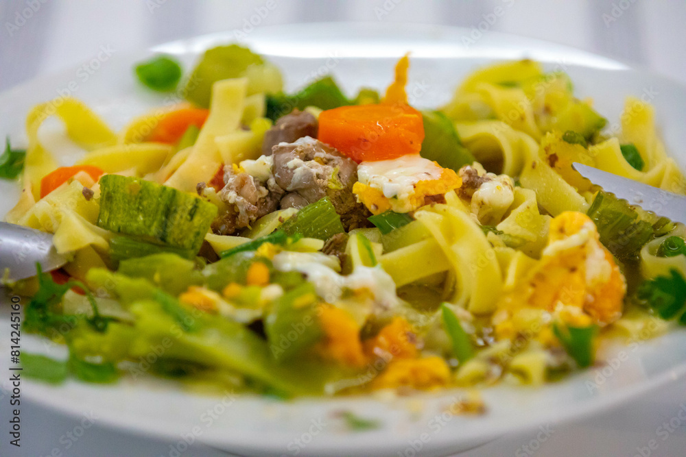 Traditional capeletti soup with chicken and vegetables. Typical winter dinner soup Traditional capeletti soup with chicken and vegetables. Typical winter dinner soup