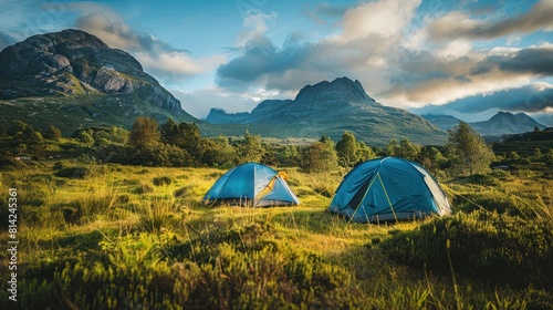 Highland Camping Adventure: Two Tents Set Up in Dramatic Mountain Scenery for an Active Lifestyle Experience