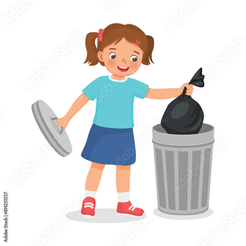 Cute little girl taking out the trash in garbage bag into recycling bin