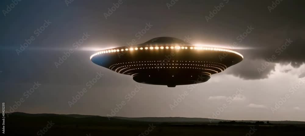 Nighttime footage of large, random lights from a UFO under stormy clouds