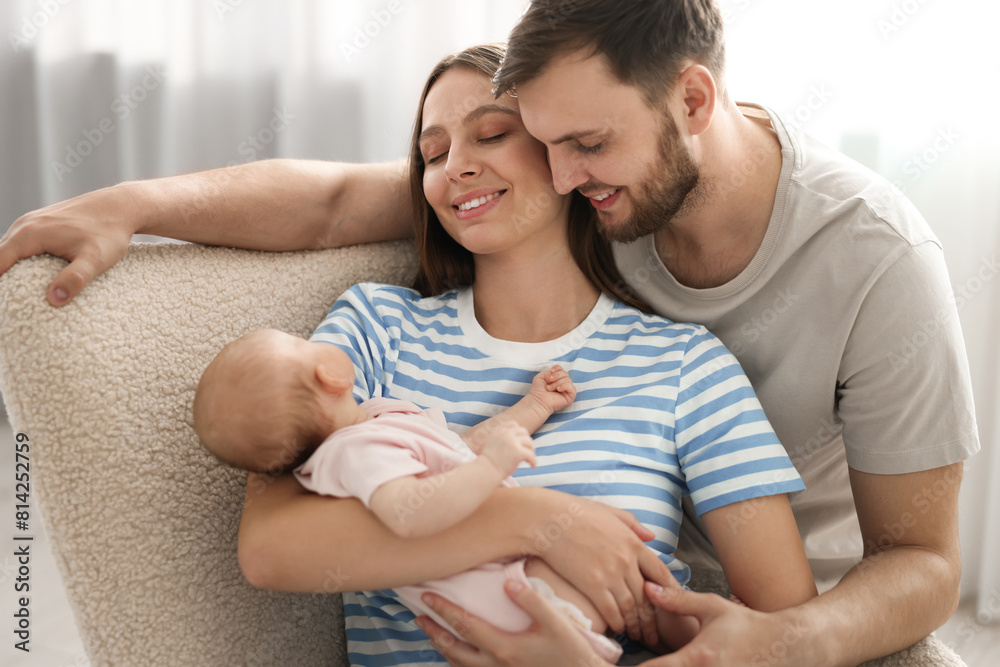 Happy family. Parents with their cute baby at home Happy family. Parents with their cute baby at home