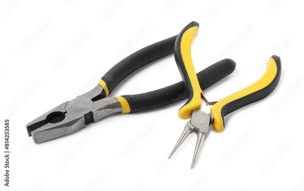 Different pliers isolated on white. Construction tool Different pliers isolated on white. Construction tool